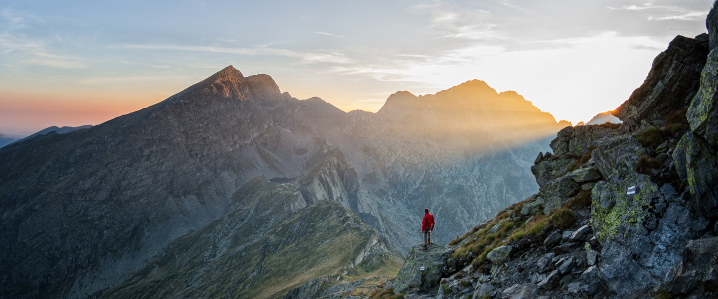 hiker in mountain range